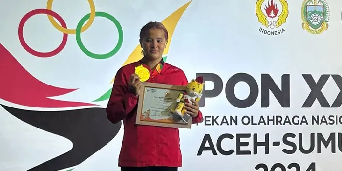 Lilly Kartina Beales Raih Emas di Nomor 50 Meter Gaya Kupu-Kupu Putri PON XXI Aceh-Sumut 2024